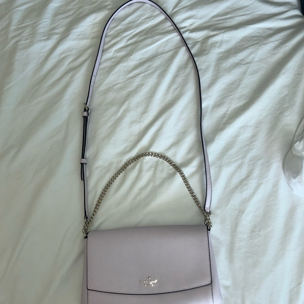 Beautiful lavender color cross Body Kate Spade handbag